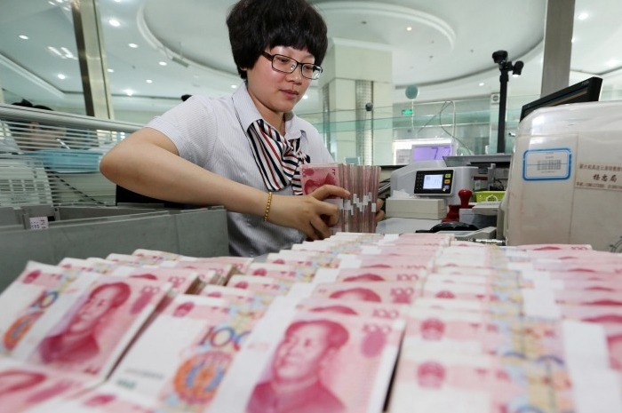 China's government debt ratio within reasonable range, risks controllable, finance minister says